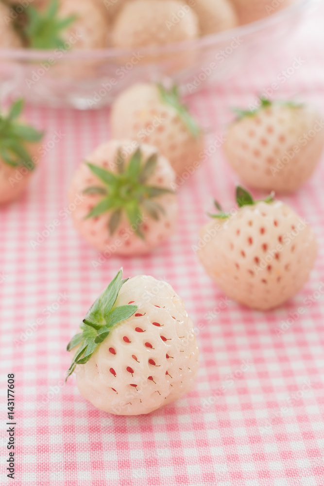 Pineberries or Hula Berry a hybrid strawberry with a pineapple flavor white flesh and red seeds