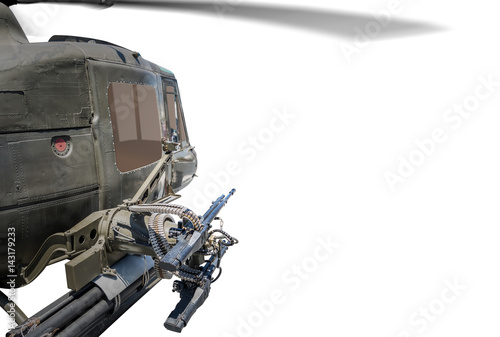 Closeup of army helicopter with machine gun.