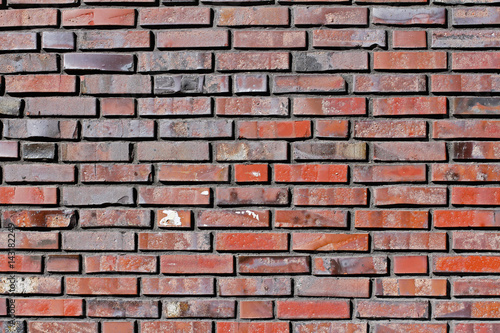 Brick wall with grey and red bricks (background, texture)