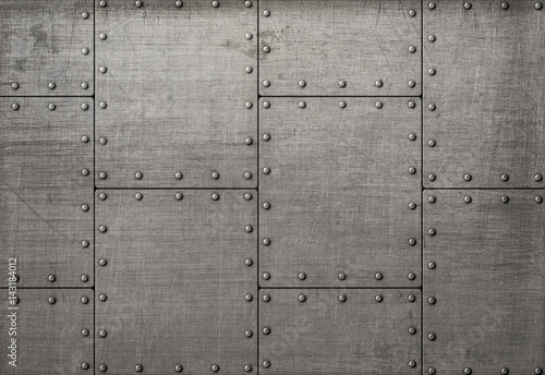 Dark metal plates with rive...