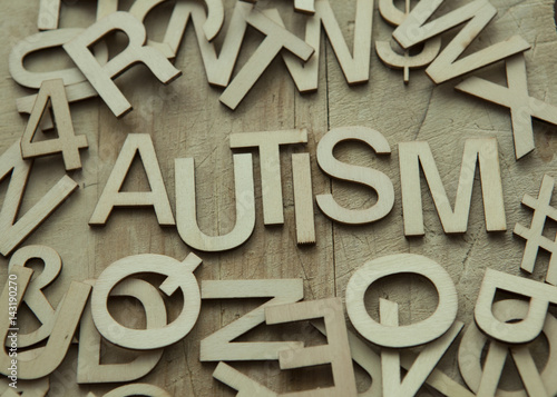 Autism spelled in wood letters photo