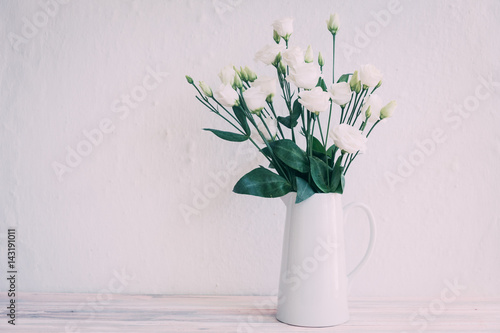 White roses in vase 