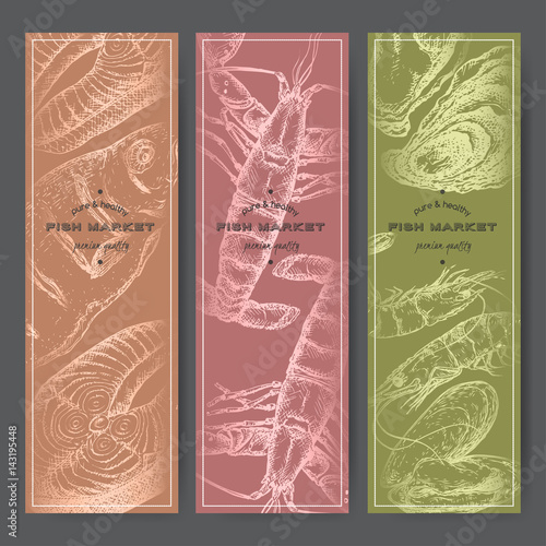 Three vertical banners with fish, shrimps, lobster, oysters silver sketches.