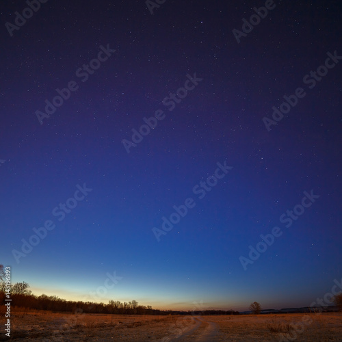 Starry sky on a background of the morning dawn.