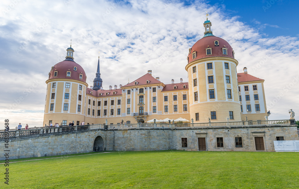 MORITZBURG, GERMANY - JULY 2016: Moritzburg Castle with tourists. This is a major attraction in Saxony