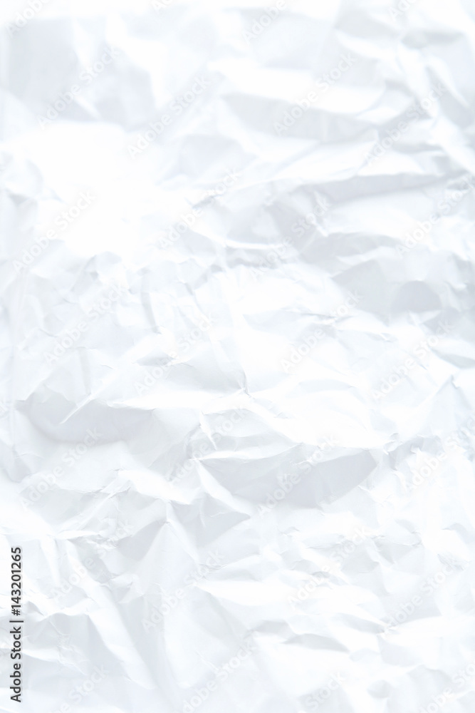 The white crumpled paper background The white crumpled paper background