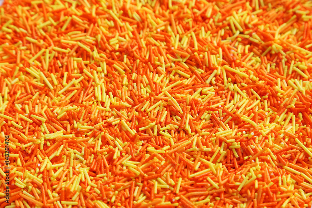 Colorful sprinkles in white plate