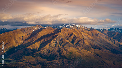 Landscape view of mountain range at sunrise, Wanaka Lake, NZ