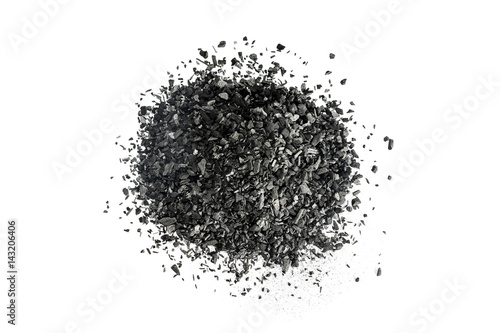 Pile of Carbon charcoal on white background photo