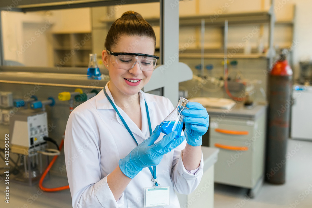 Young girl in the laboratory, experiments Young girl in the laboratory, experiments