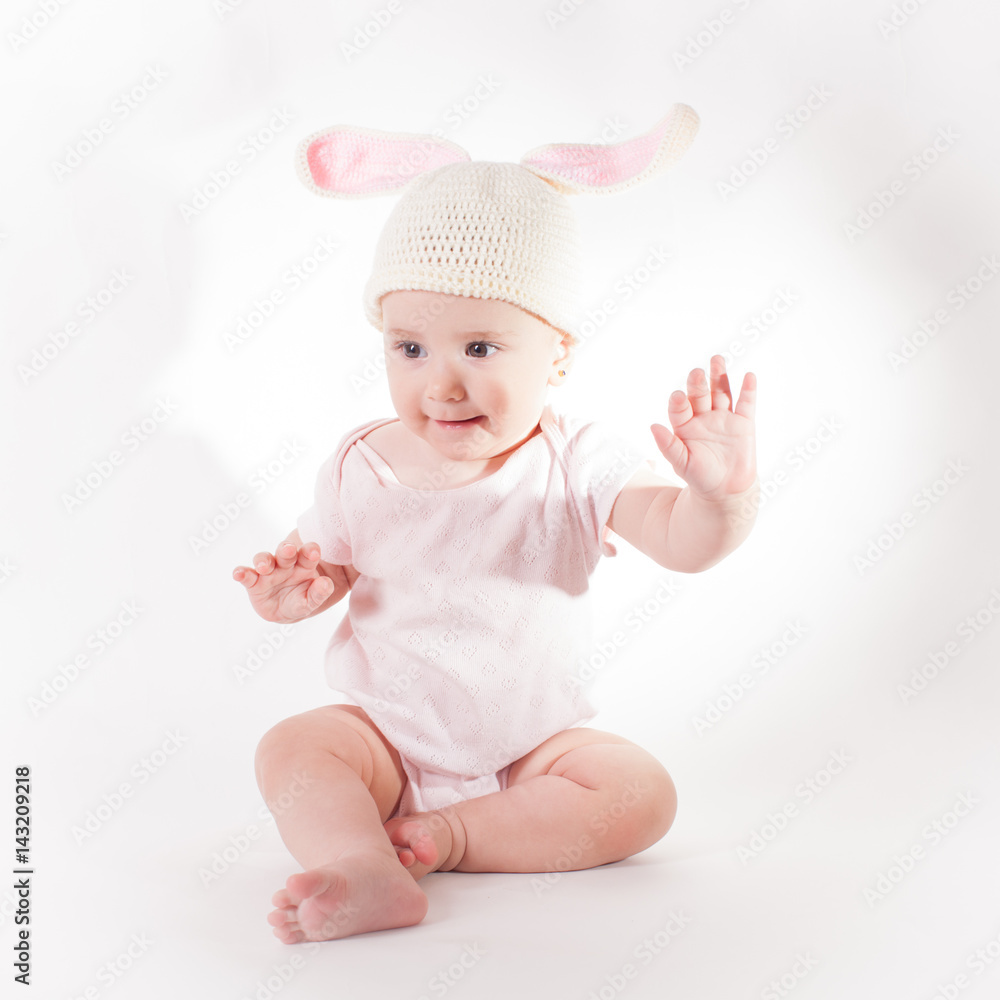 Baby girl in a rabbit hat