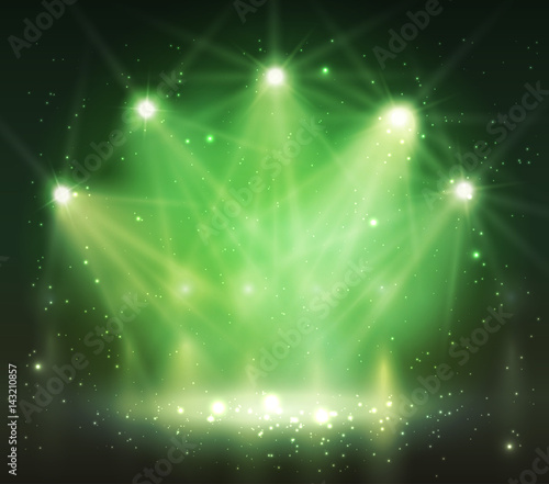 Spotlight on stage with smoke and light.