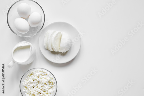 Healthy food concept with milk on white table top view mock-up