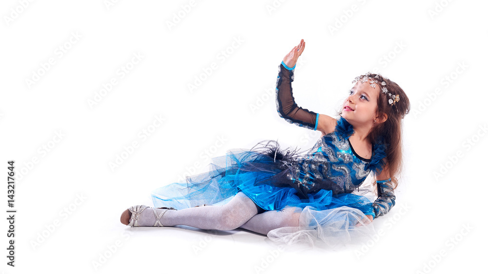 Fototapeta premium Littl Girl Dancer Poses with Leg Lifted in Tap Shoes and Costume