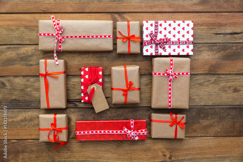 Fototapeta premium Natural style handcrafted gift boxes with rustic twine on burlap
