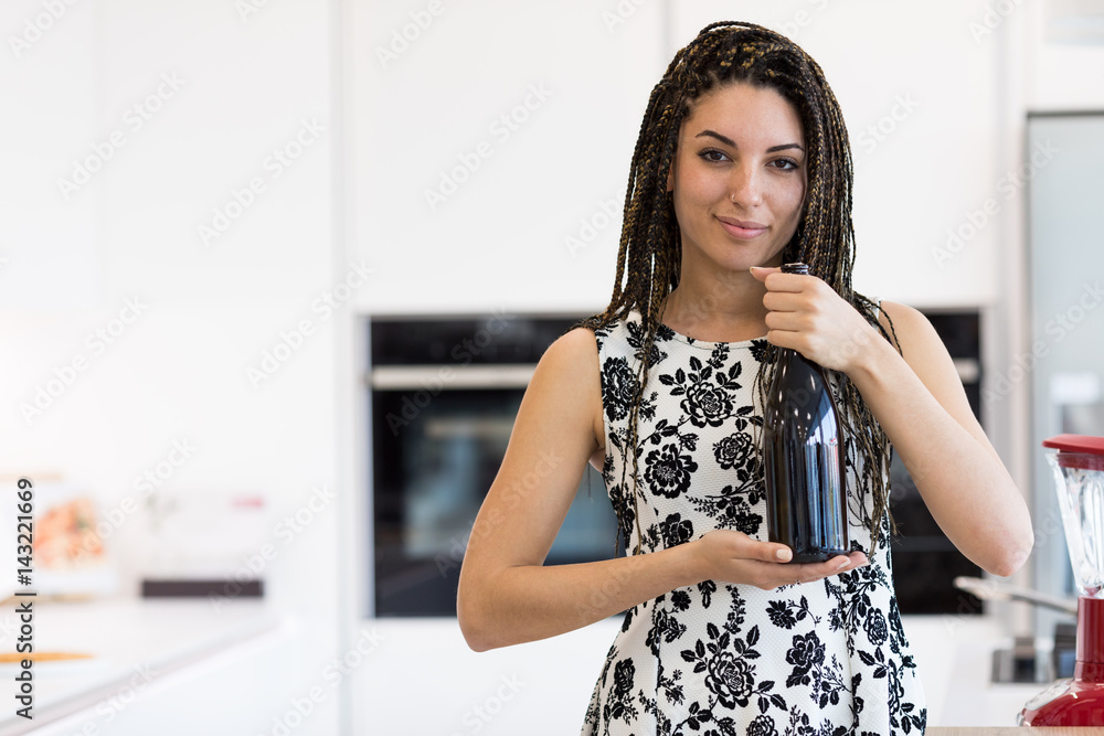 Pretty woman with bottle of vine Pretty woman with bottle of vine