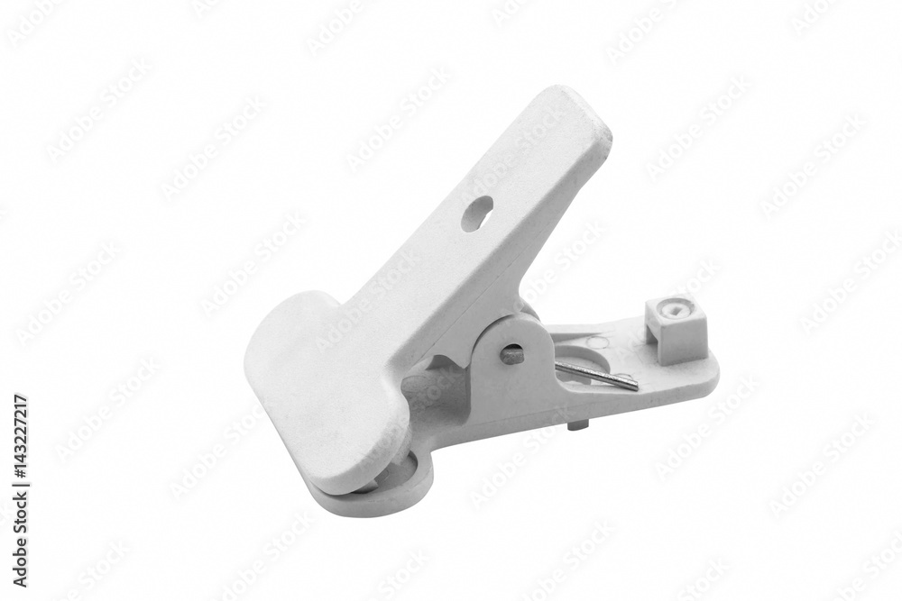 White plastic clips, background holder for photography on a white background White plastic clips, background holder for photography on a white background