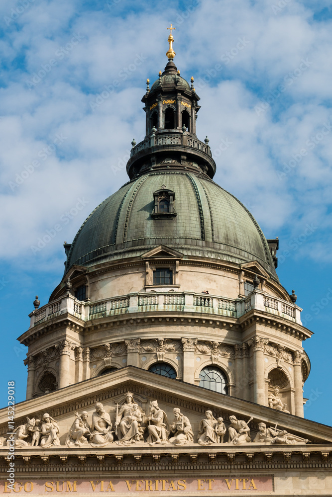 Fragment of St. Stephen's Basilica in Budapest, Hungary. Roman catholic church in neoclassical style against the blue sky