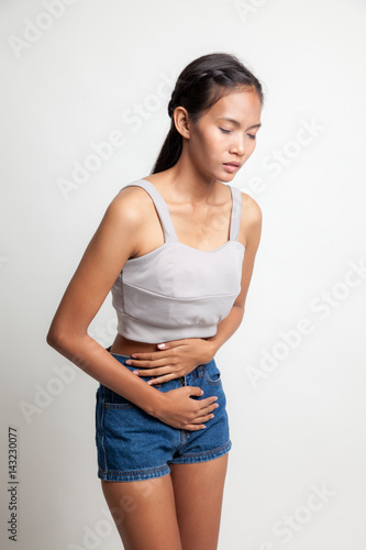 Young Asian woman got stomachache. © halfbottle
