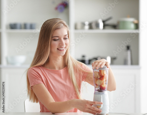 Young woman preparing fresh...
