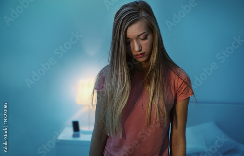 Obraz na płótnie Young sleepy woman suffering from somnambulism at home