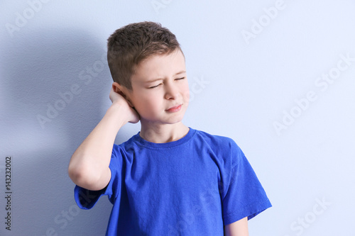 Cute boy suffering from hea...