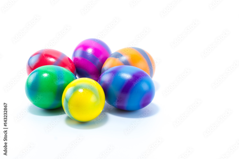 Six hand colored easter eggs - yellow, blue, green, red, pink, orange with stripes isolated in white background Six hand colored easter eggs - yellow, blue, green, red, pink, orange with stripes isolated in white background