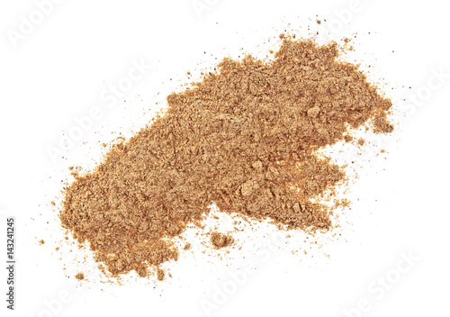 Pile of cinnamon powder isolated on a white background