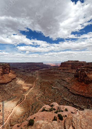 The road as it cuts through the canyons of Canyonlands National Park near Moab, Utah