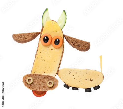 Cow made of black bread and cheese