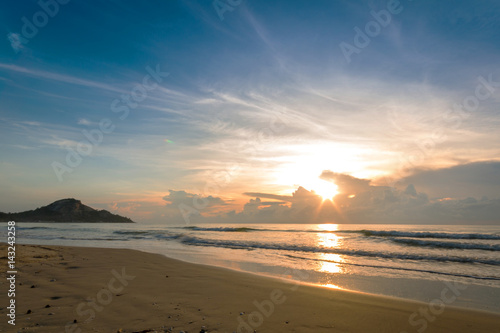 Beach and Tropical Sea at Sunset