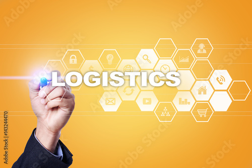 Businessman drawing on virtual screen. logistics concept.