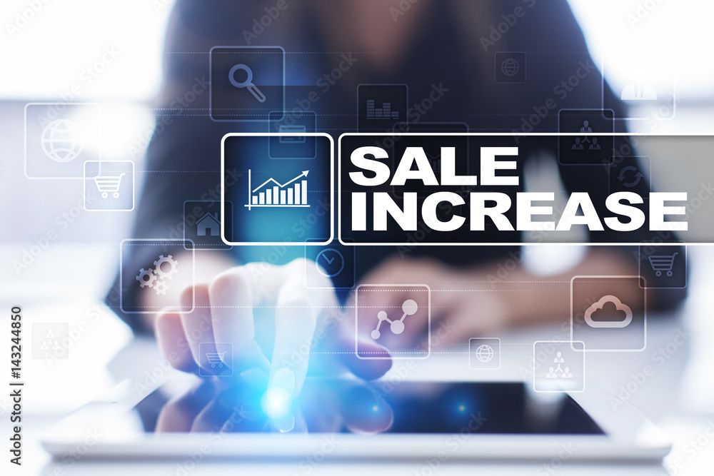 Woman using tablet pc, pressing on virtual screen and selecting sale increase. Woman using tablet pc, pressing on virtual screen and selecting sale increase.