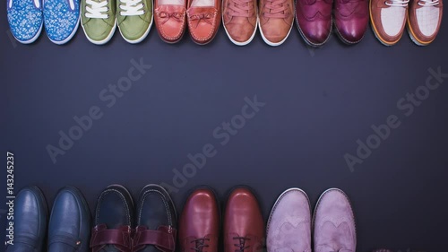 Great Party. Guests Arrived. Shoes Move on a Black Background.tuffles, Sneakers, Sneakers. Stop Motion Animation. Top View. 4K.