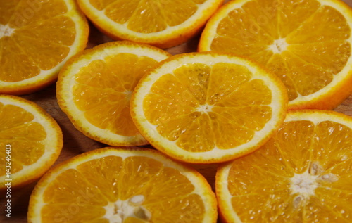 Background of sliced  juicy oranges fruit