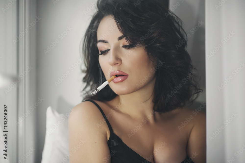 portrait lonely thoughtful the girl with a cigarette in a mouth portrait lonely thoughtful the girl with a cigarette in a mouth