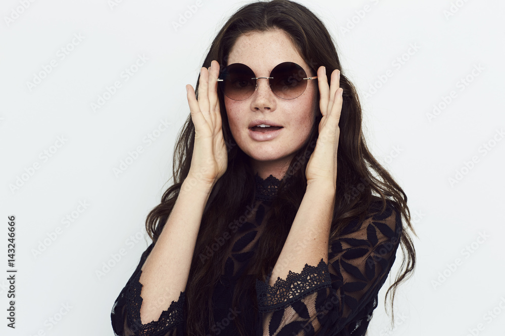 Chic girl in shades and black lace, portrait Chic girl in shades and black lace, portrait