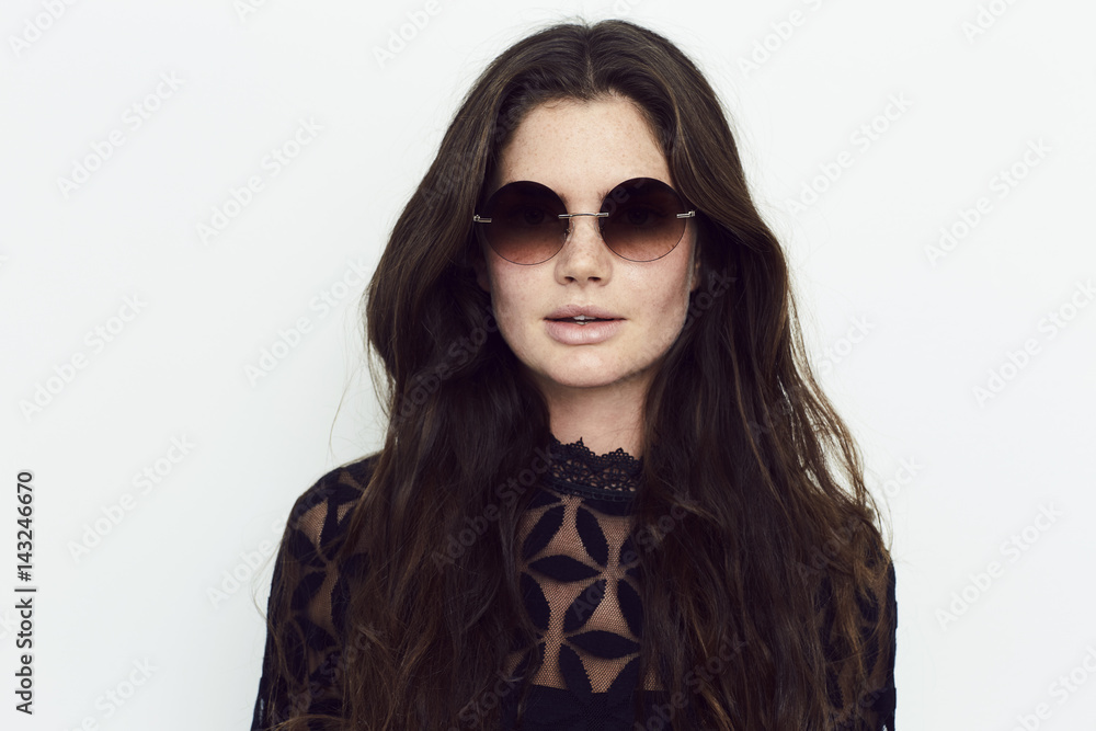 Sunglasses and lace top on brunette beauty, portrait Sunglasses and lace top on brunette beauty, portrait