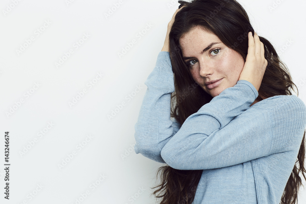 Beautiful green eyed woman in blue top, portrait Beautiful green eyed woman in blue top, portrait