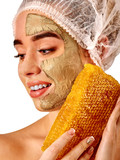 Facial honey clay face mask for woman . Honeycombs natural homemade organic threatment. Skincare health concept on isolated.