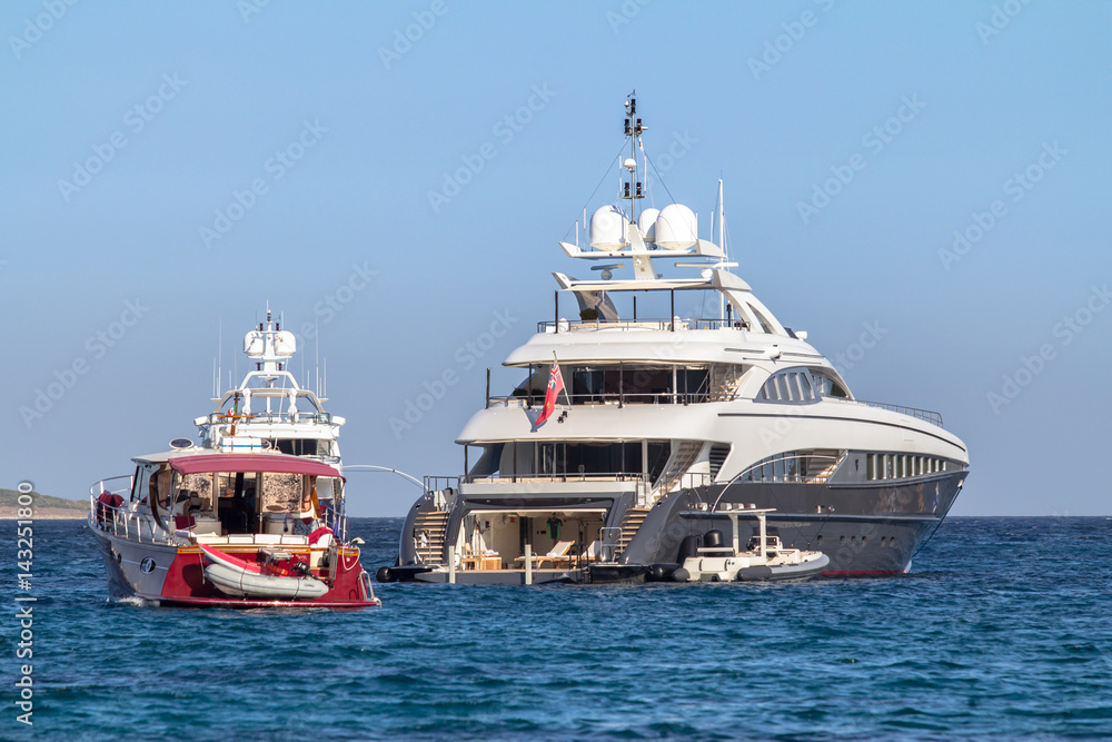 Luxury yachts at Porto Cervo bay at Sardinia Island, Italy Luxury yachts at Porto Cervo bay at Sardinia Island, Italy