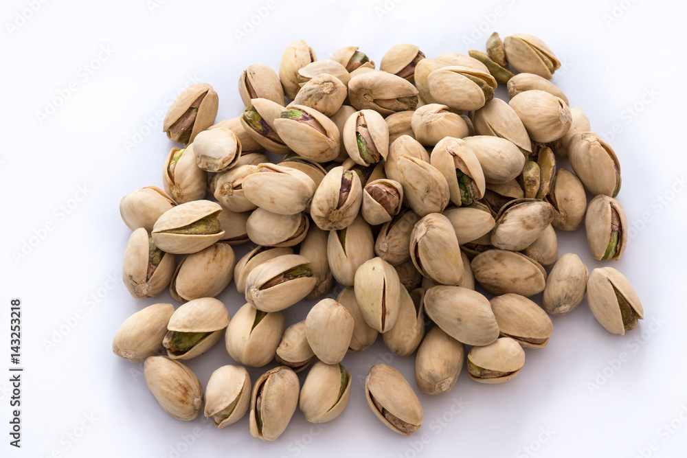 Group of Pistachio nuts on a white background