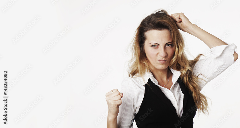 I'm very angry!!! Nervous businesswoman standing clenching his fists ready to fight and disputes. (Work, office life, leadership, conflict, body language, gestures concept) I'm very angry!!! Nervous businesswoman standing clenching his fists ready to fight and disputes. (Work, office life, leadership, conflict, body language, gestures concept)