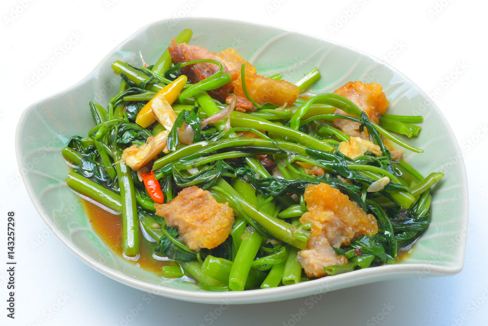 Thai Food Fried Morning Glory with Crispy Pork
Thai Food Fried Morning Glory with Crispy Pork