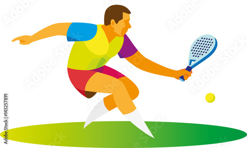 Young padel tennis player takes the ball
