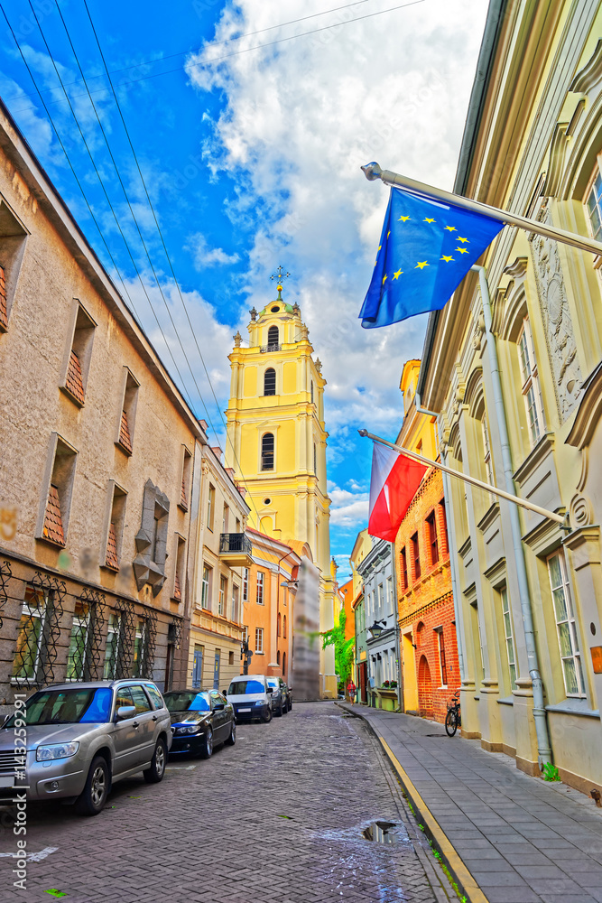 Street and Bell tower of St John church Vilnius University