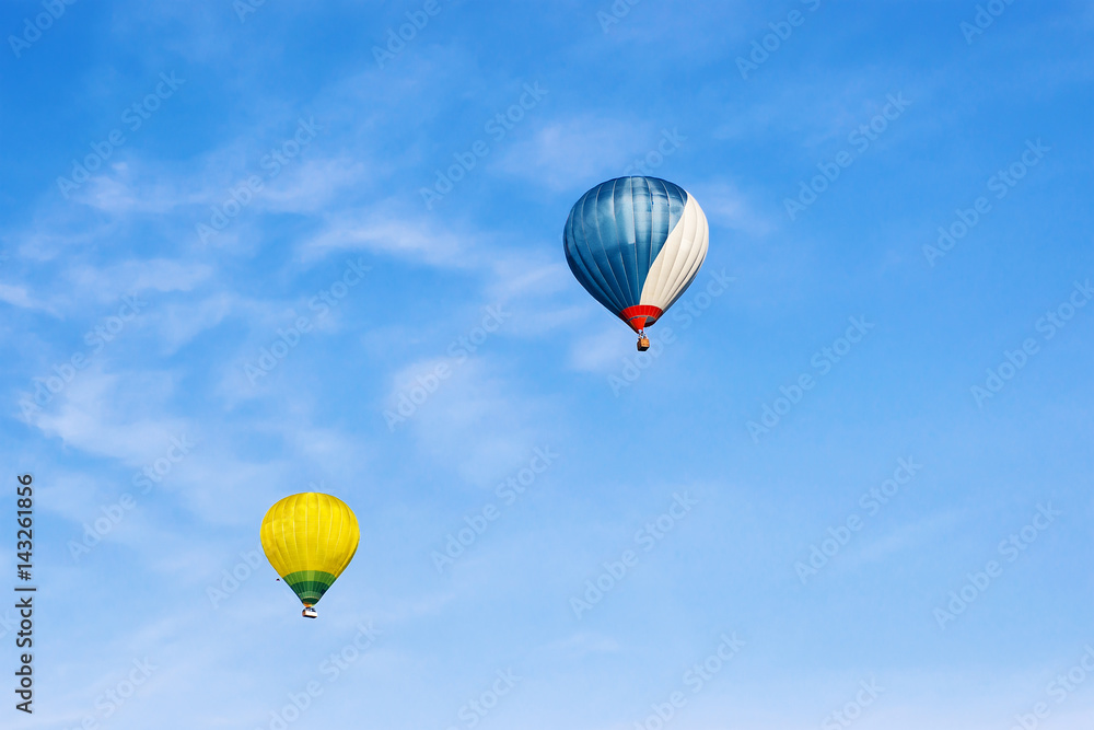 Fototapeta premium Colorful Air balloons flying high in sky Vilnius