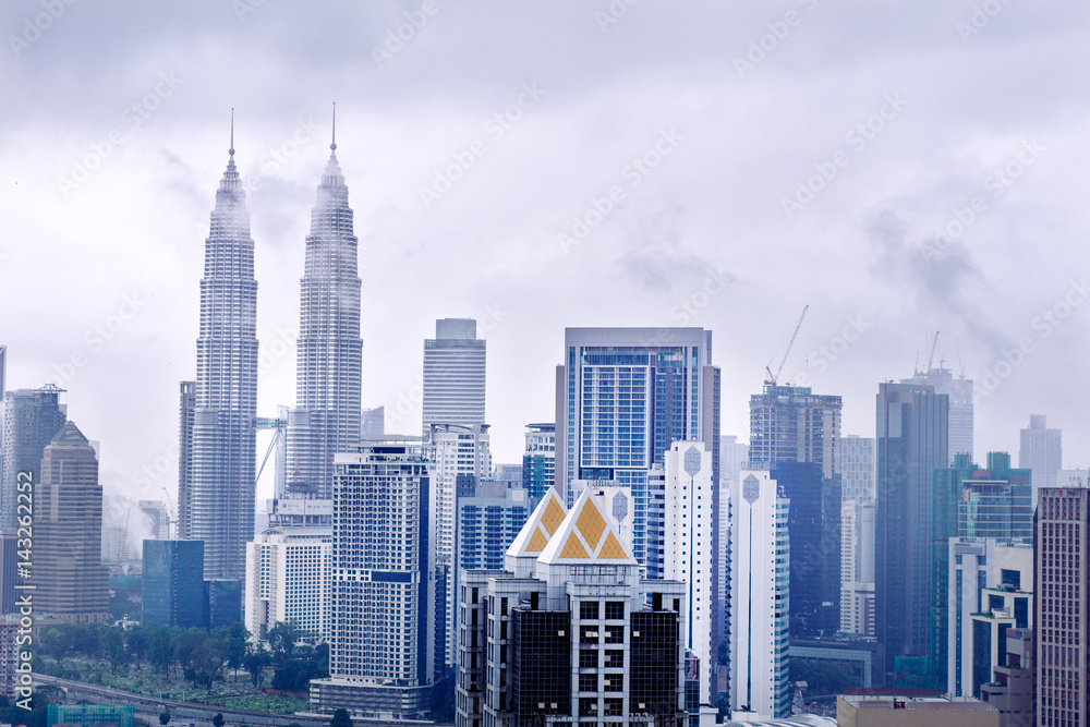 Cityscape with cloudy sky and scyscrapers. Megapolis Kuala-Lumpur, Malaysia. 25th of November 2015.