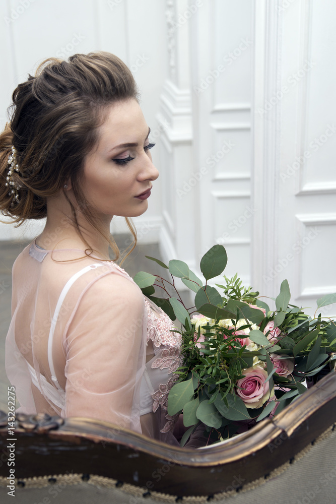 bride's morning. Young girl posing in pink sheer nightie bride's morning. Young girl posing in pink sheer nightie