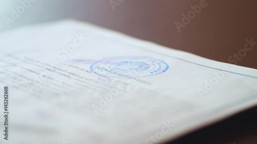 puts a seal on the contract. Slow motion. Close up